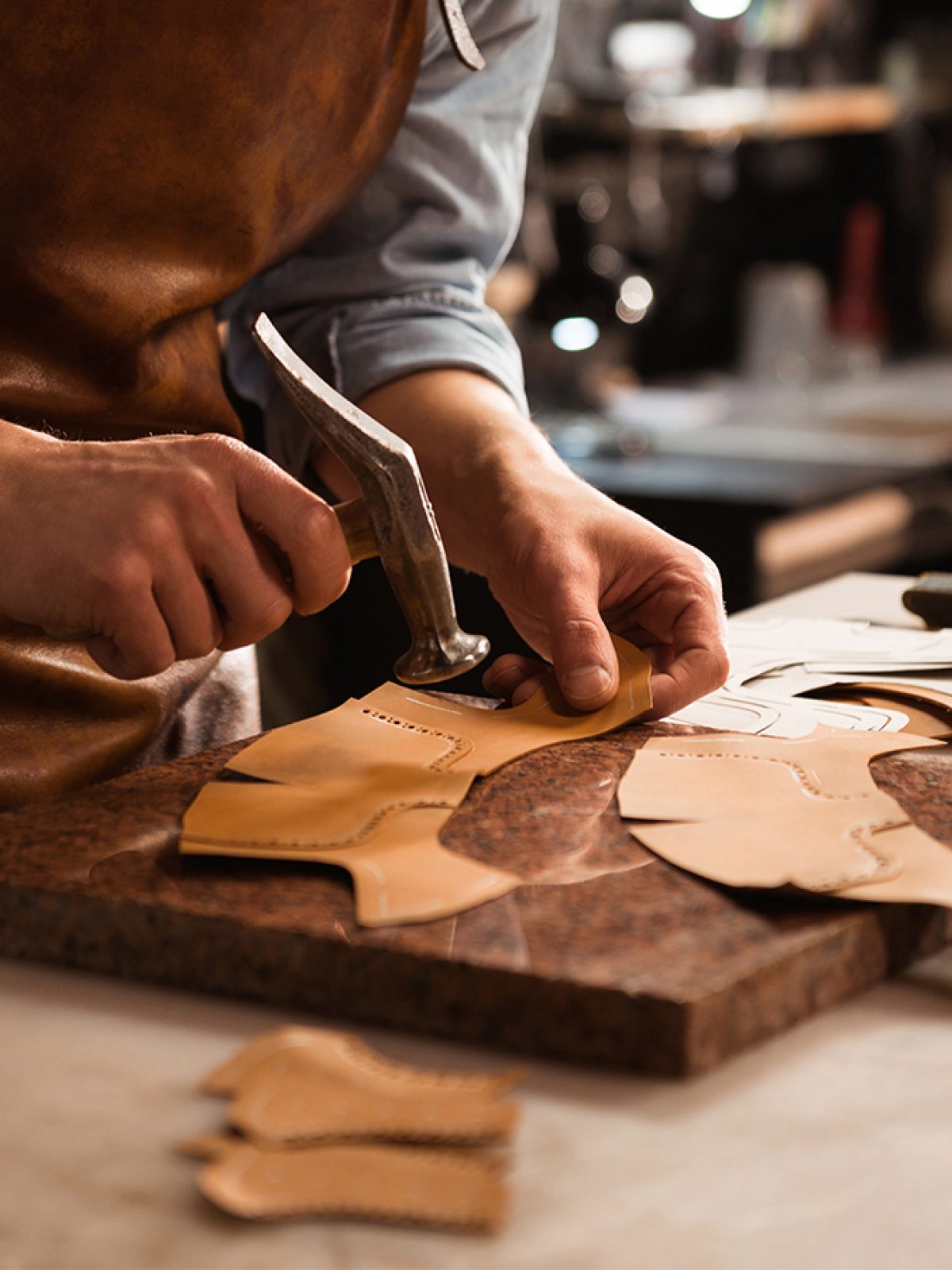close-up-of-a-shoemaker-man-working-with-leather-PDZL8DE.jpg close-up-of-a-shoemaker-man-working-with-leather-PDZL8DE.jpg